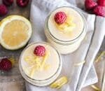 Fresh lemon raspberry yogurt in mason jars, perfect for a refreshing dessert.